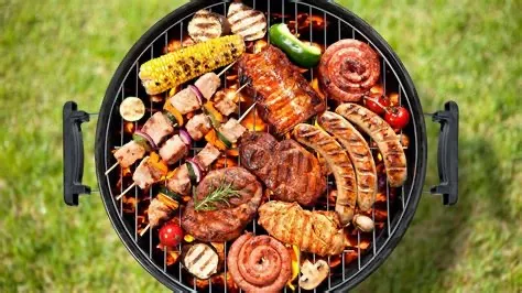 A grill with many different types of food on it.